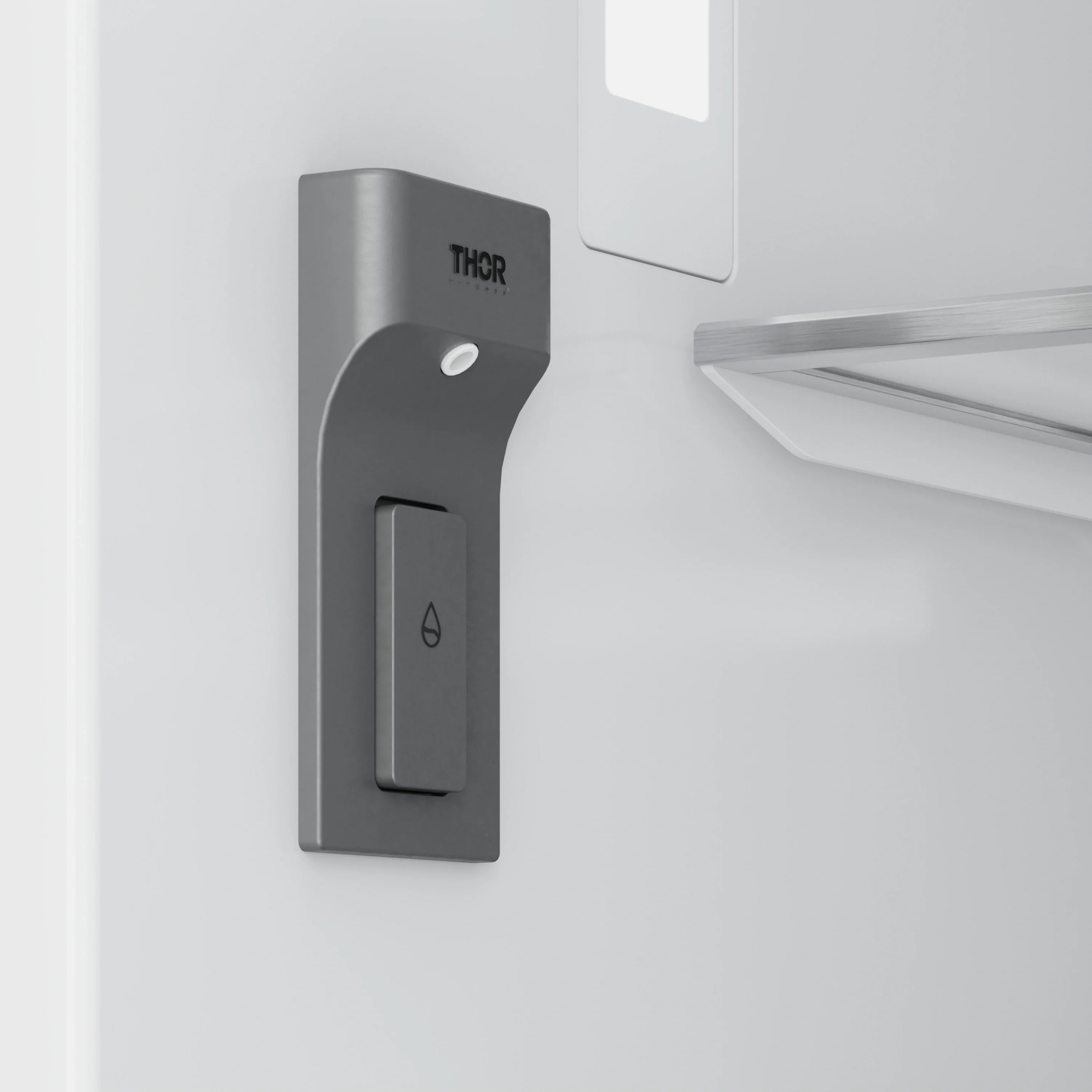 Thor Kitchen built-in refrigerator ice/water dispenser module on white door.