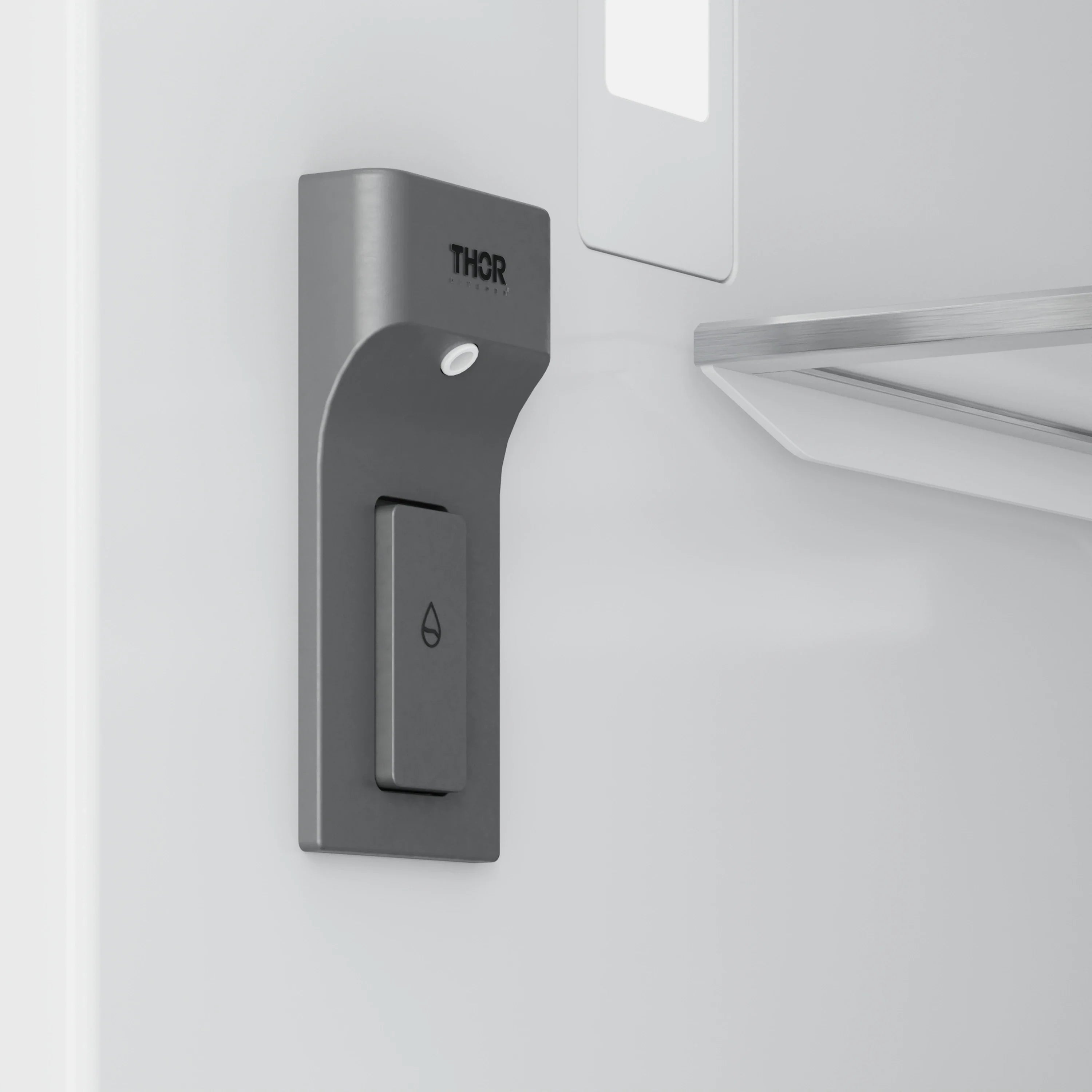 Stainless door control area with THOR logo and recessed handle.