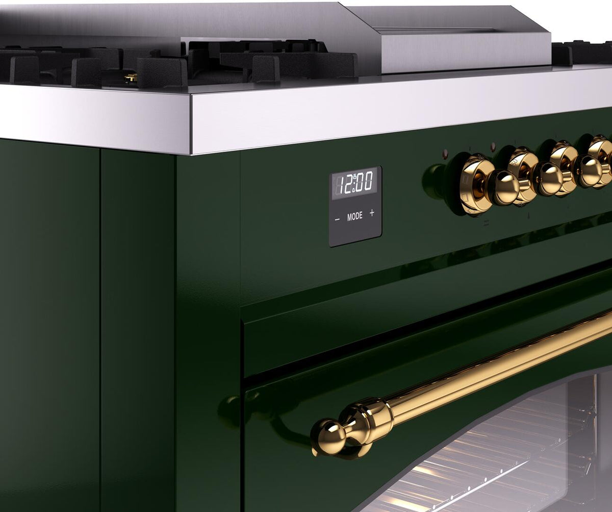 Emerald green range side control panel with digital display and brass control knobs