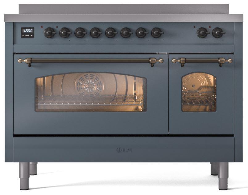 Freestanding induction range front, oven glass window and control knobs visible in blue grey