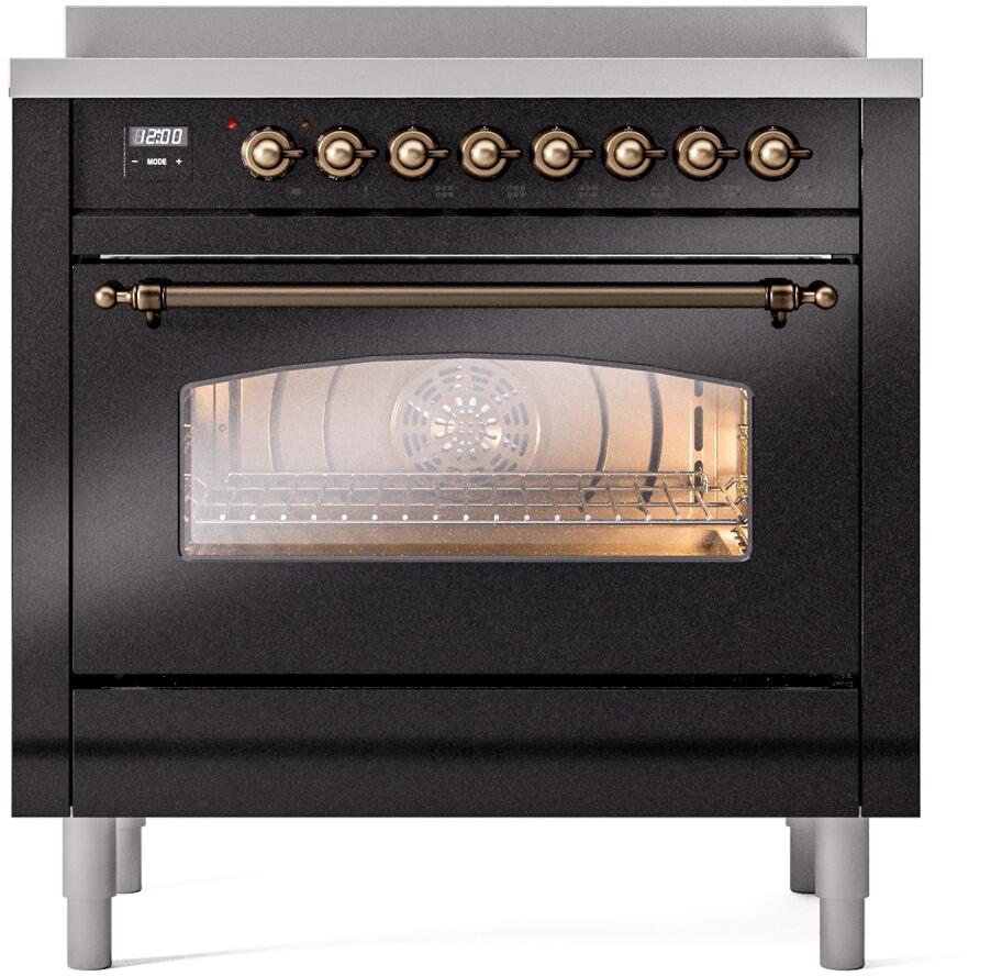 Freestanding electric induction range with glass oven door and bronze control knobs