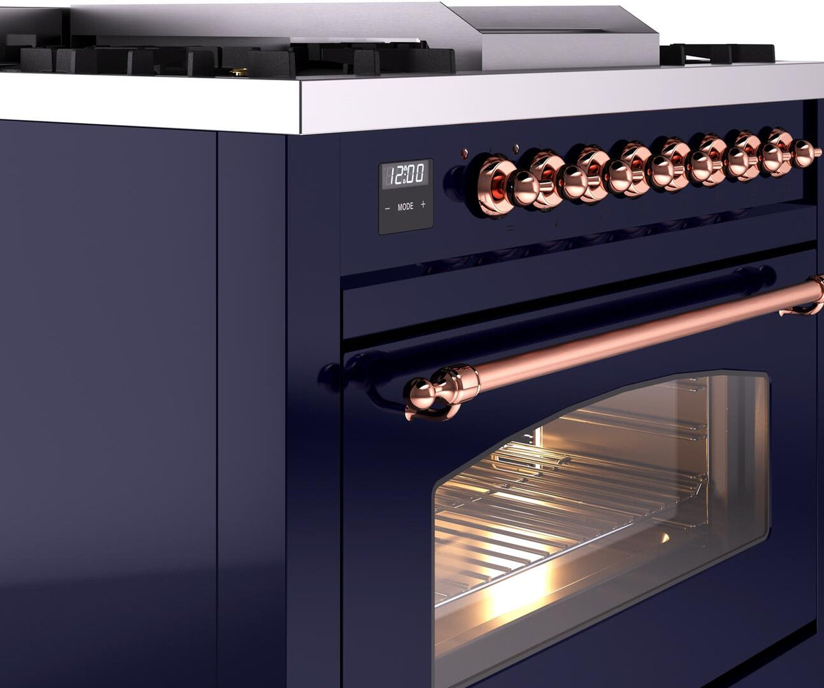Dual fuel range control panel with copper knobs and handle over an open oven door