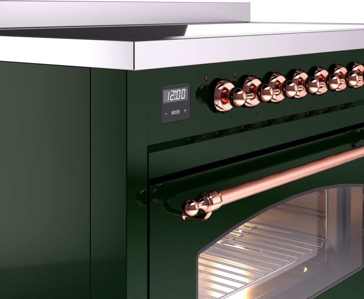 Emerald green induction range control knobs and display with copper trim and oven light