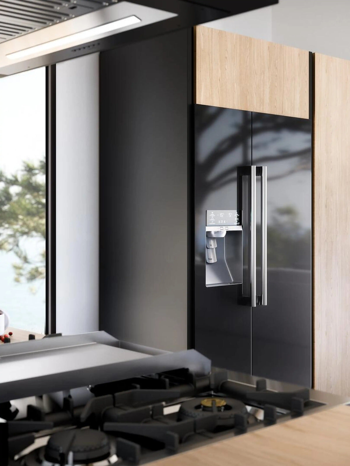 Glossy black freestanding gas range with cooktop burners and side control panel
