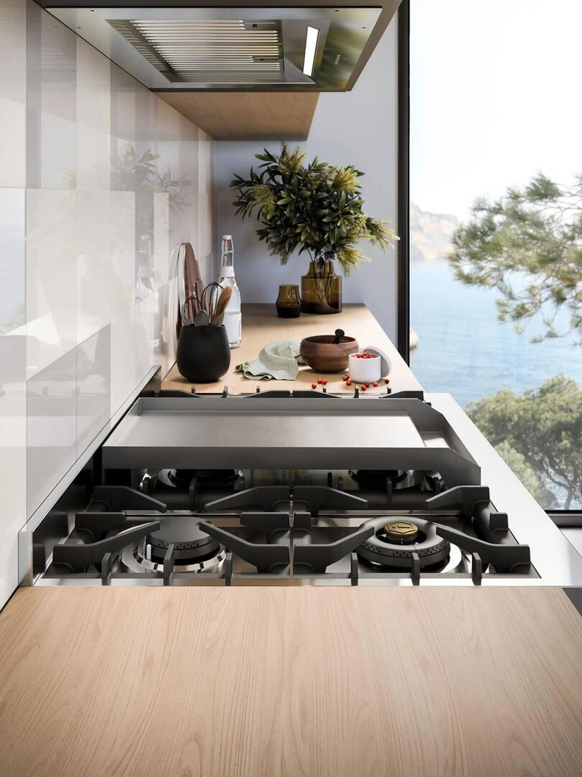 Freestanding dual fuel range in black with front cooktop and four visible burner grates