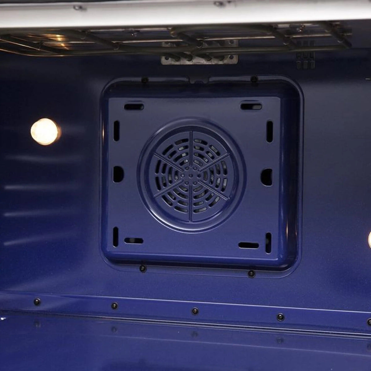 Dual fuel range underside view with circular fan vent and mounting screws