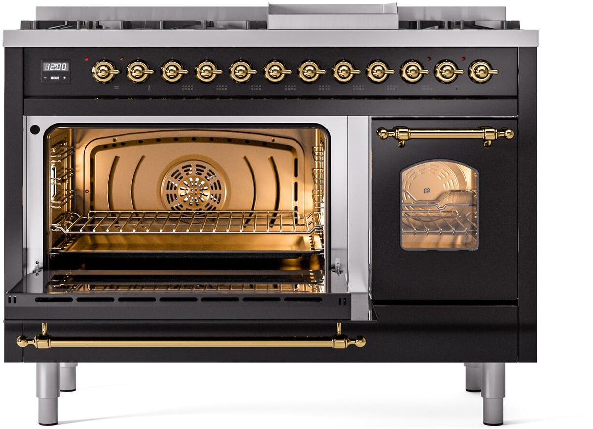 Open dual fuel range showing racks in lit ovens with brass trim across the base