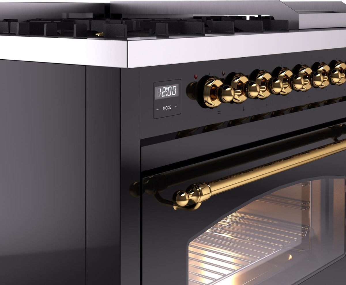 Glossy black dual fuel range with brass knob panel and open oven door window