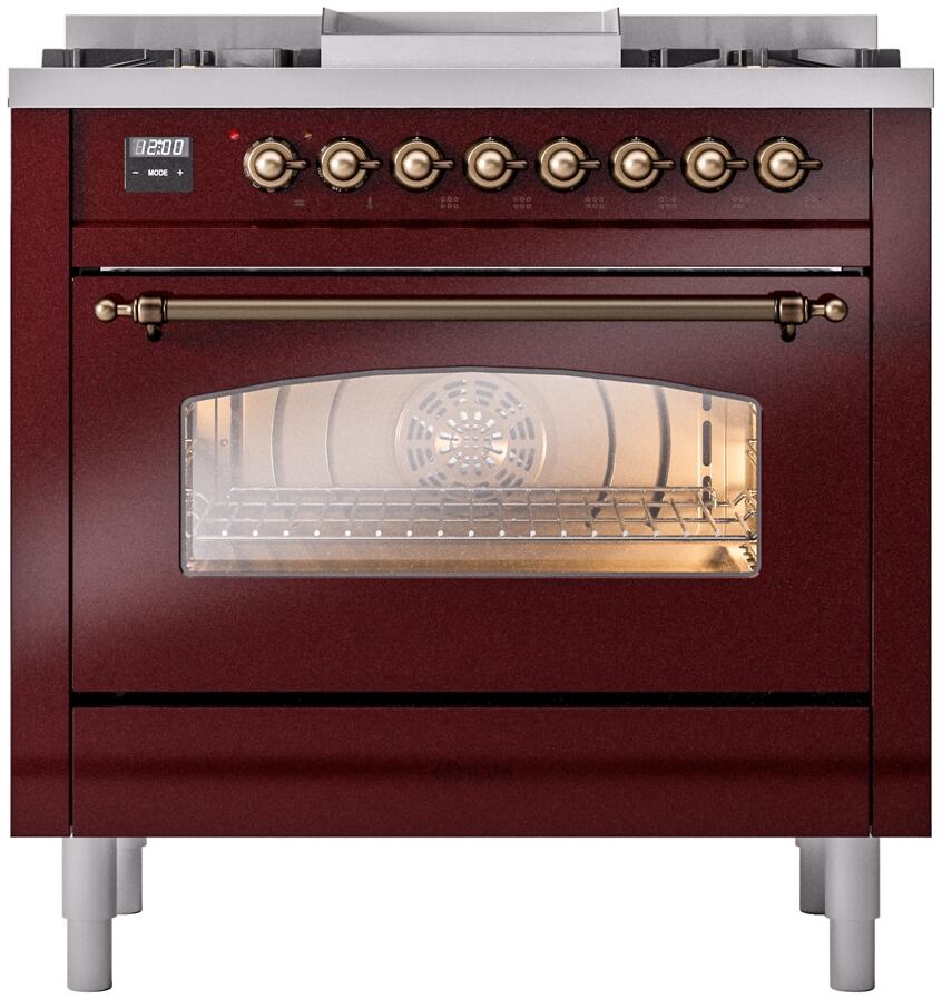 Burgundy dual fuel range oven front with glass door and bronze control knobs