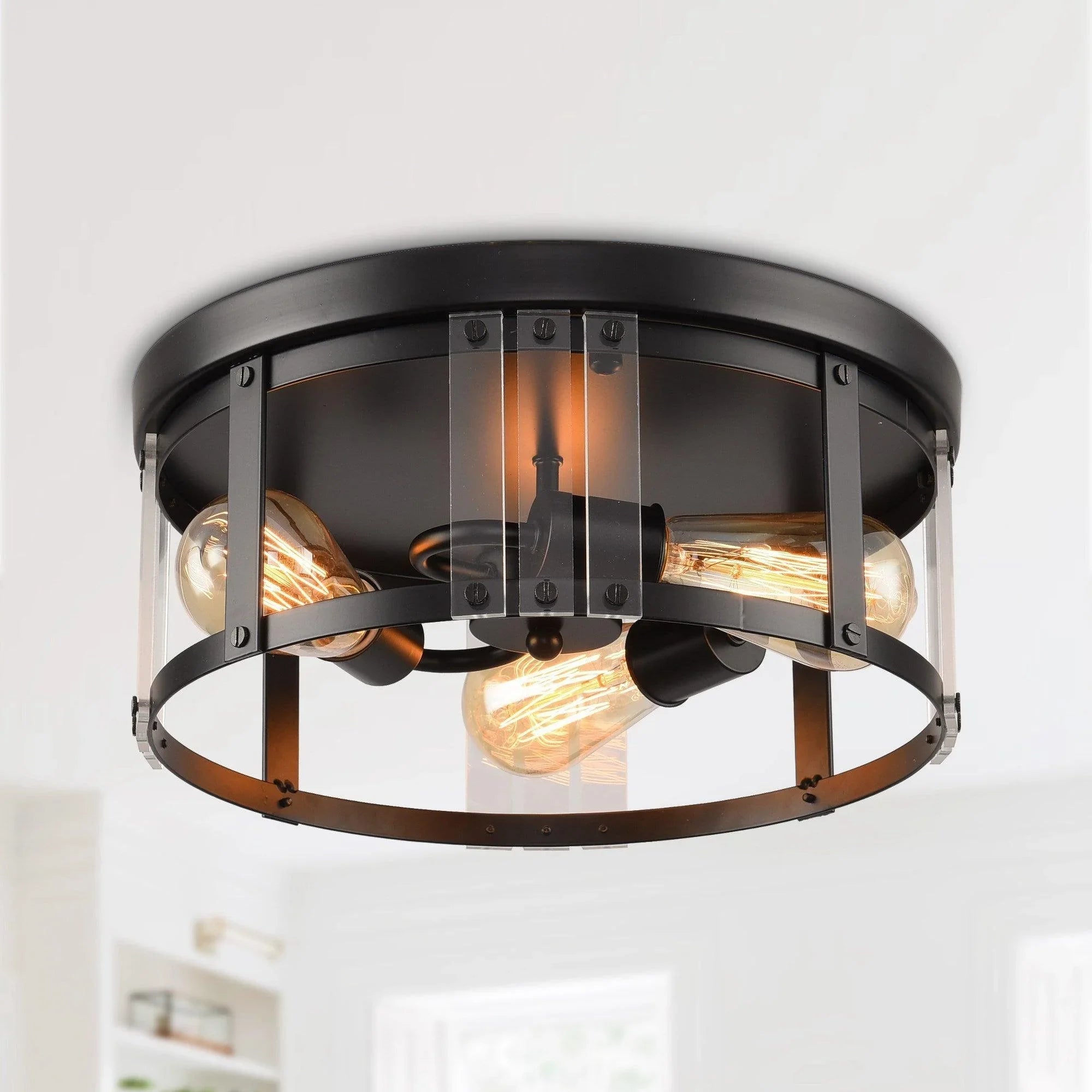 Black 3-light farmhouse flush mount ceiling light with circular frame and clear glass panels