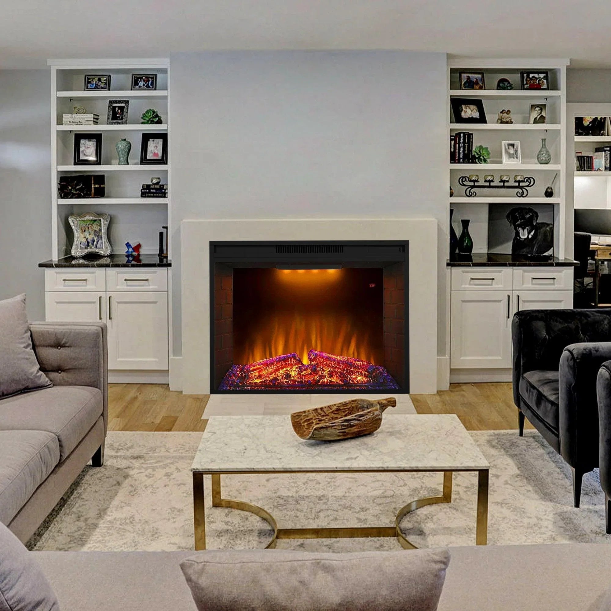 Black electric fireplace heater insert in a living room surround, burning log bed