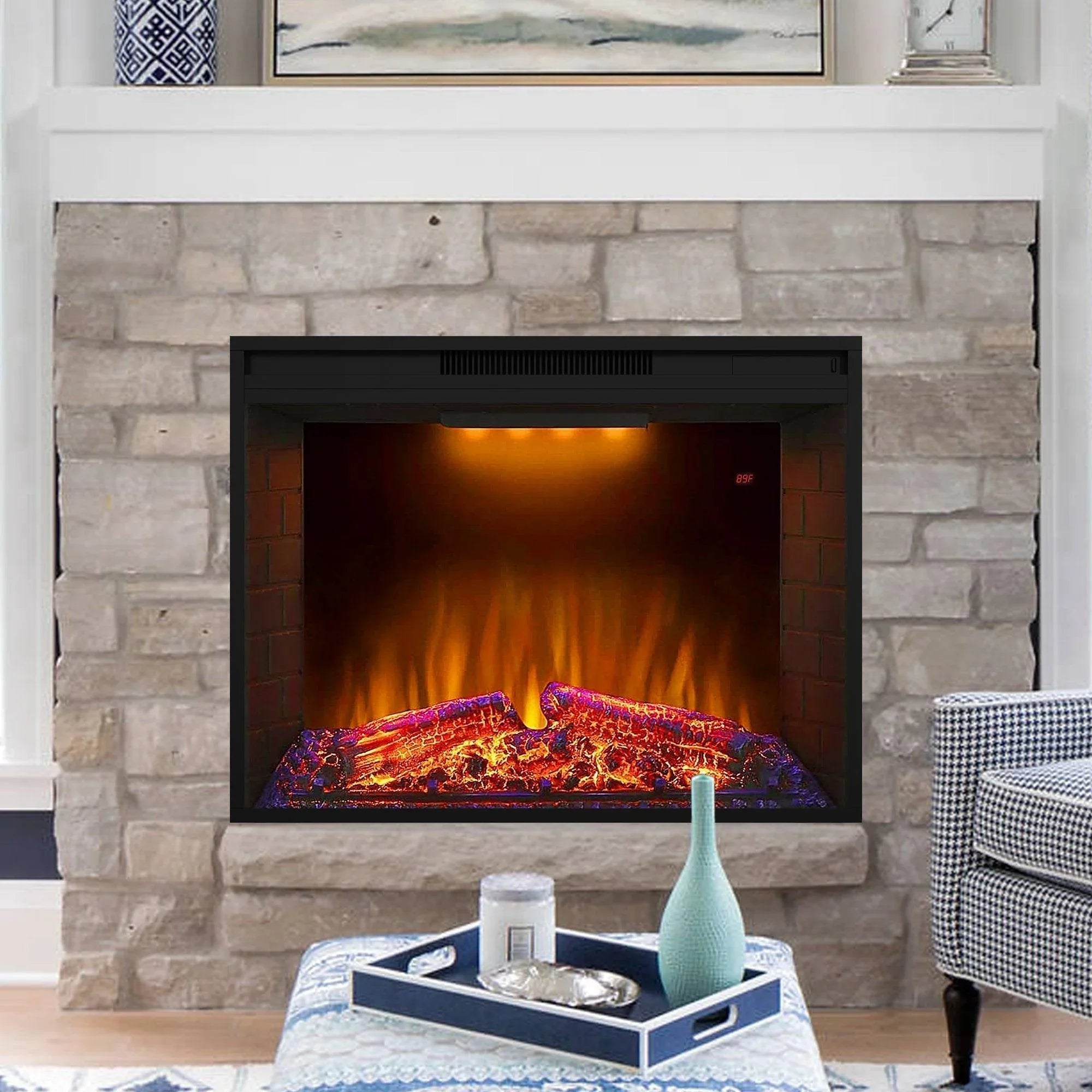 Black electric fireplace heater insert set into a stone fireplace mantel