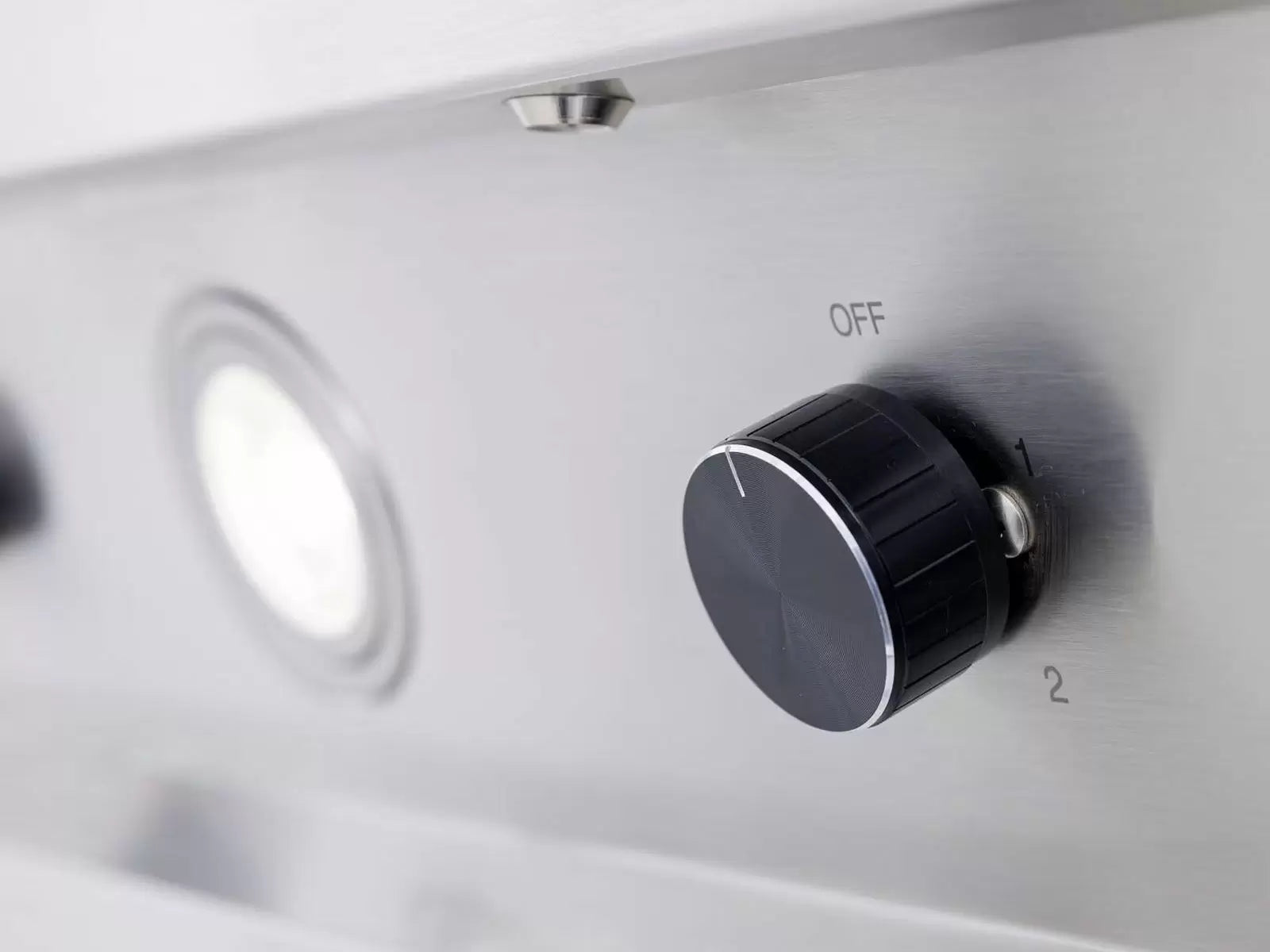 Stainless vent hood control knob with OFF indicator on front panel