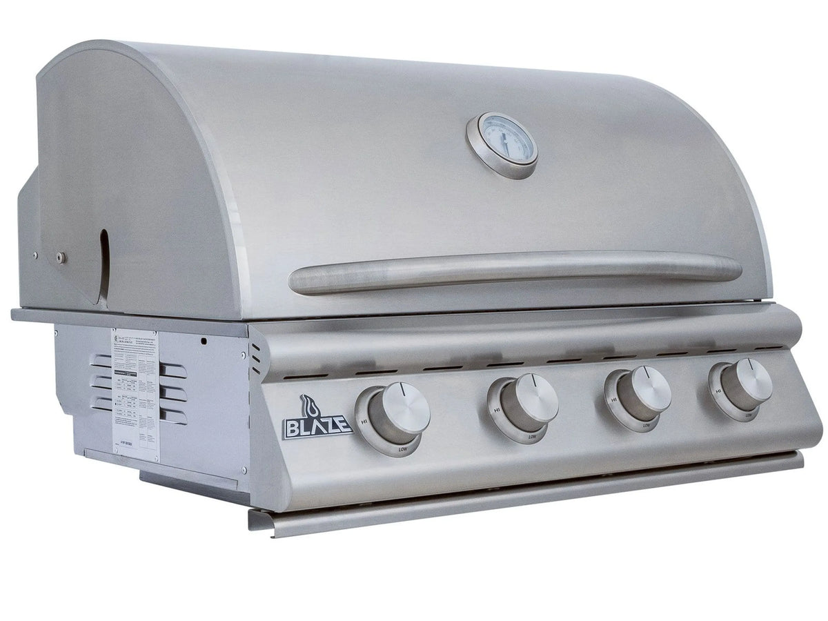 Natural gas grill with side cabinet and four stainless burner knobs under lid