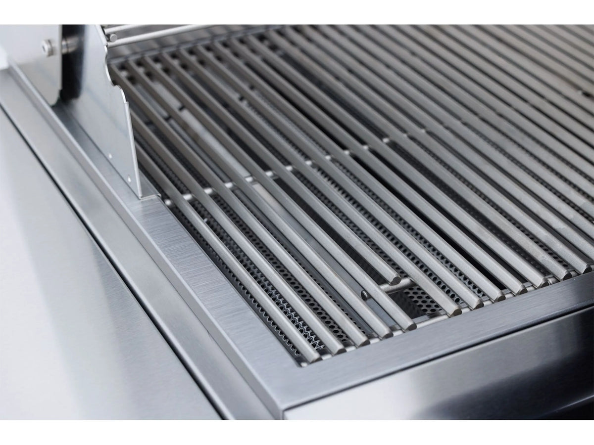 Open grill firebox showing stainless heat bars and cooking grate rails