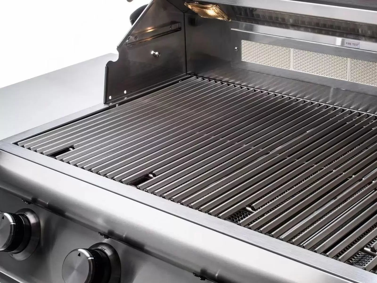 Stainless grill interior with open lid and metal cooking grate bars
