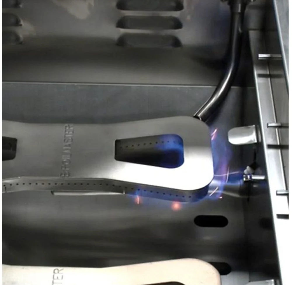 Stainless steel griddle with cooking surface and blue burner flames beneath