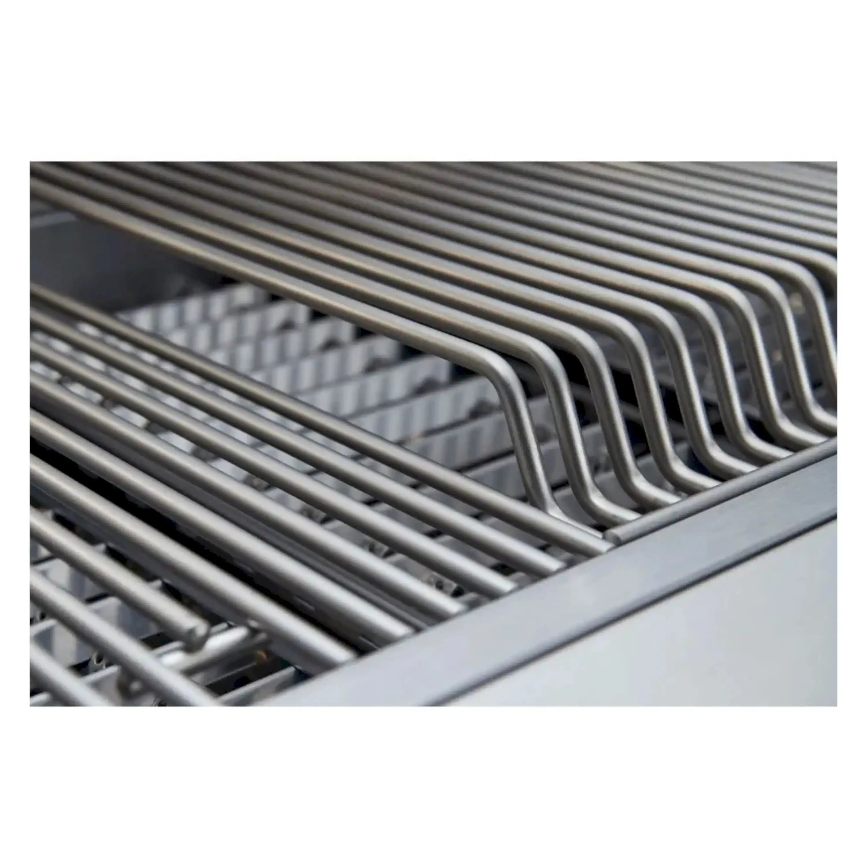 Stainless steel grill grates with curved burner tubes on a propane gas grill
