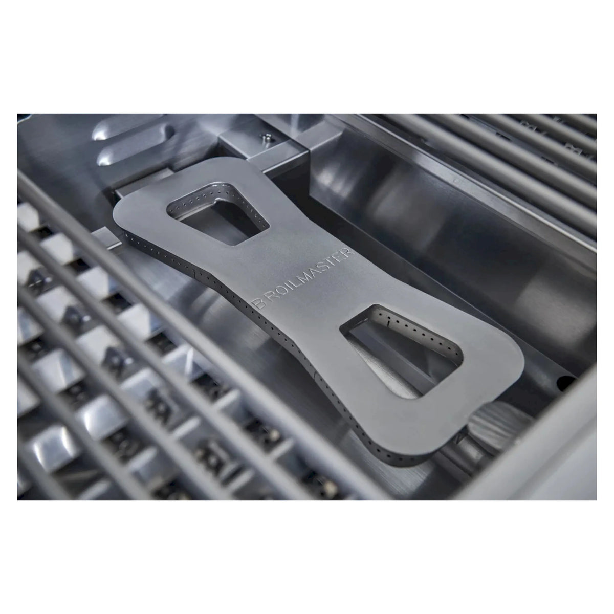 Stainless steel burner tray with Broilmaster branding and grate support bars