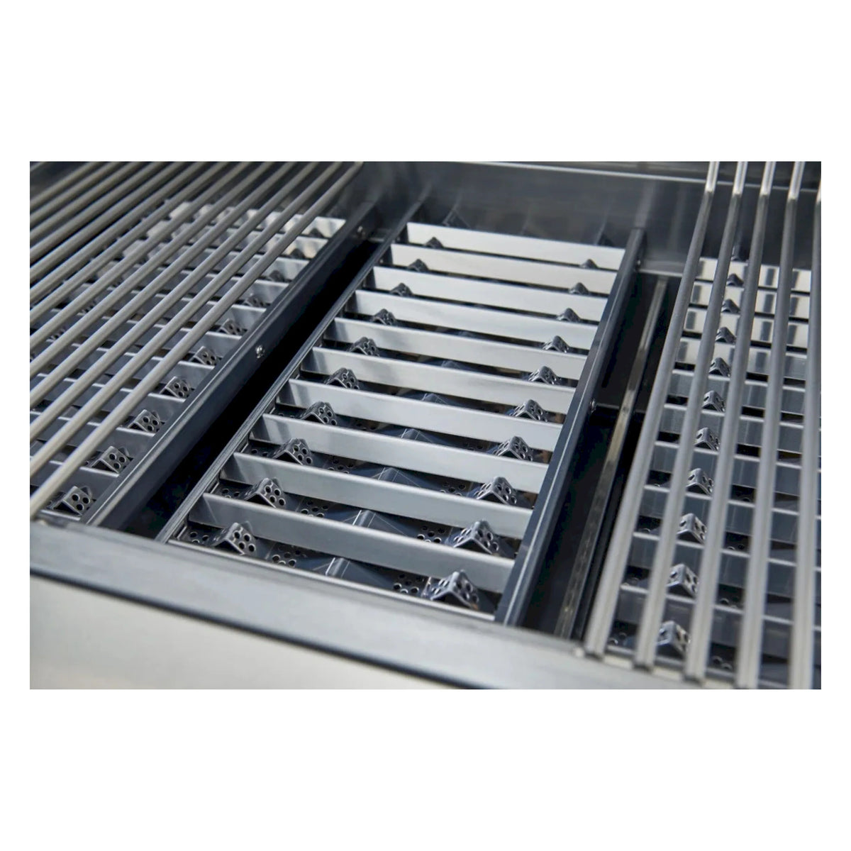 Stainless steel gas grill with removable griddle-style burner covers in the firebox
