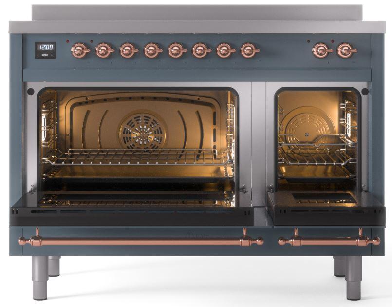 Blue-grey induction range with both ovens open and copper-trim handles, showing interior racks.