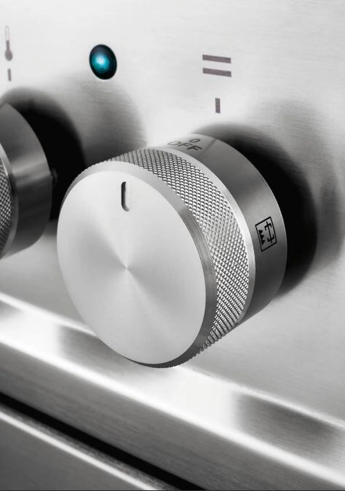 Stainless steel gas range control knob with textured dial and indicator markings