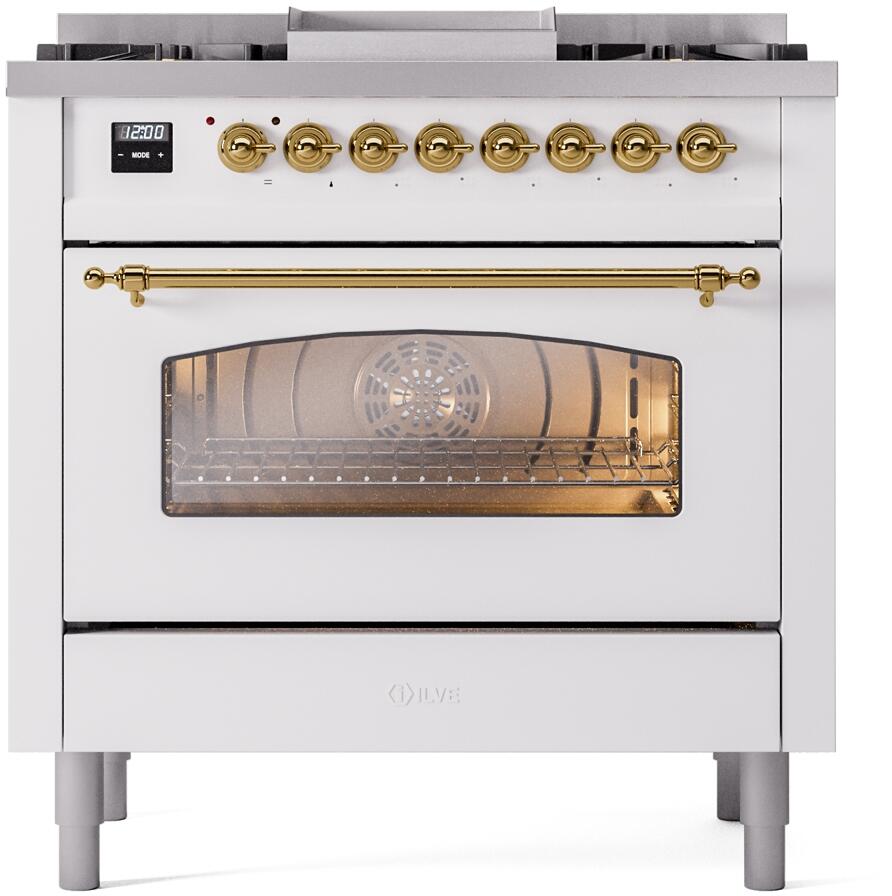 Freestanding dual fuel range with brass control knobs and oven window
