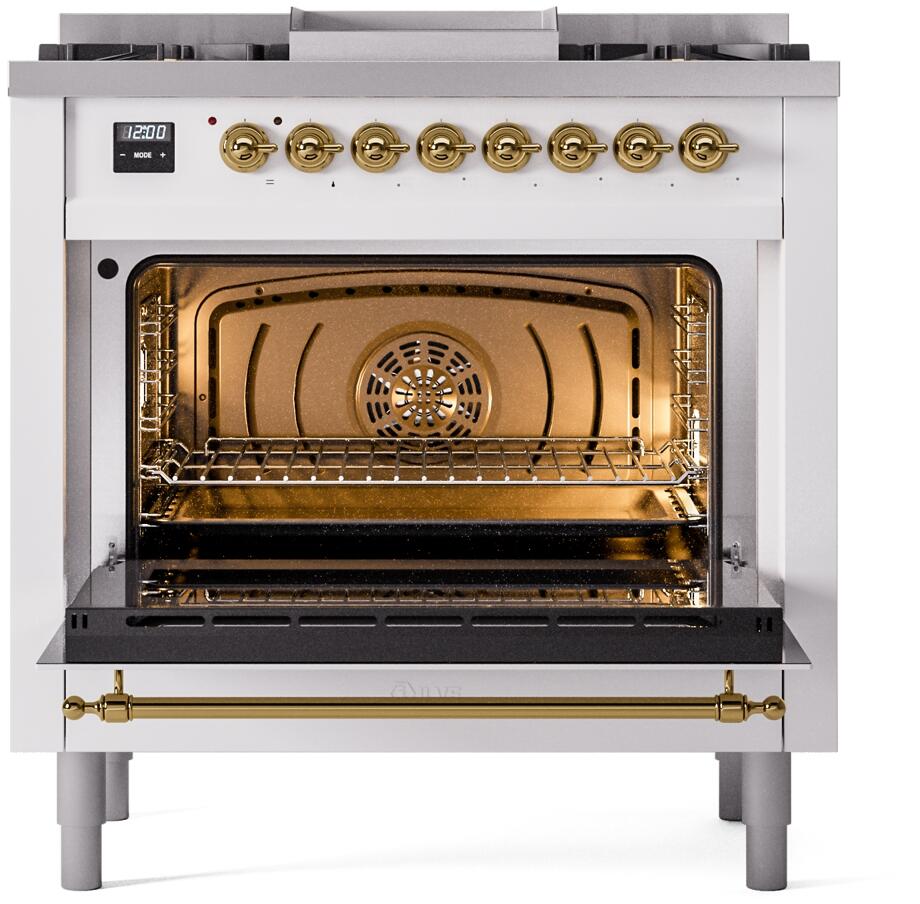 White freestanding oven door open with rack inside and brass trim