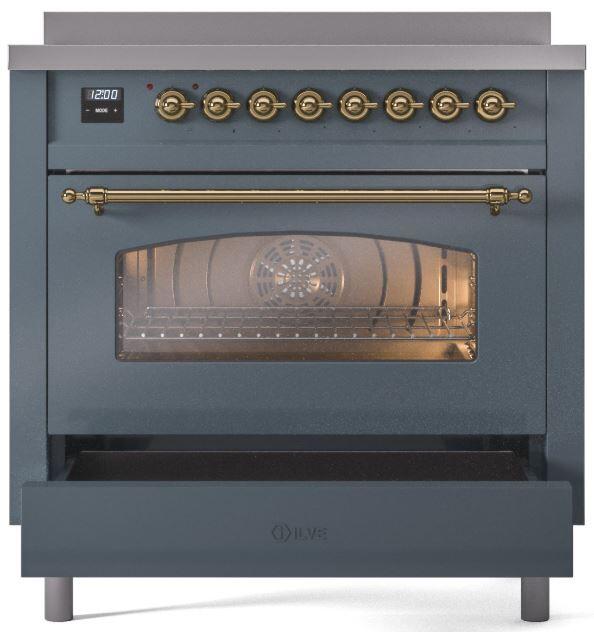 Blue grey induction range front view with brass control knobs and oven door window