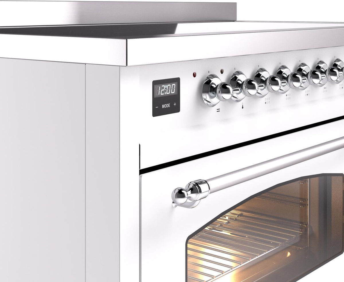 Chrome control knobs and handle on white induction range, digital display and oven door