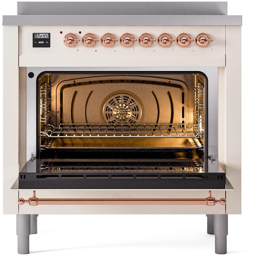 Open oven door of a freestanding range showing dark interior and copper accents