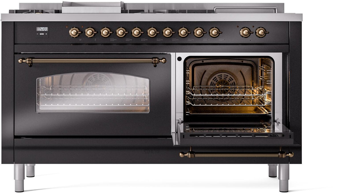 Glossy black dual-fuel range with bronze-trim open ovens and lit oven interiors
