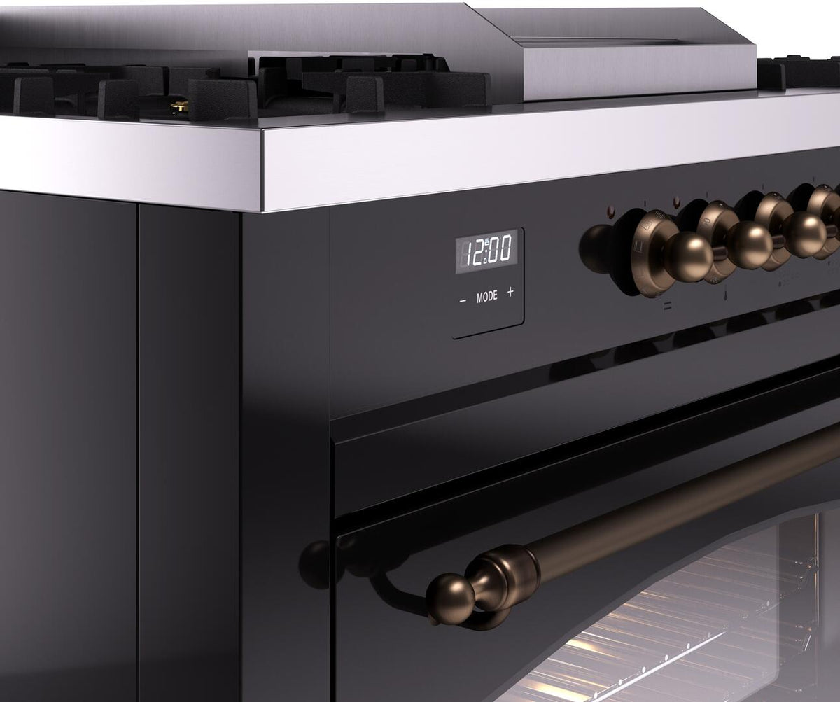 Black range control panel with bronze knobs and digital display panel on front