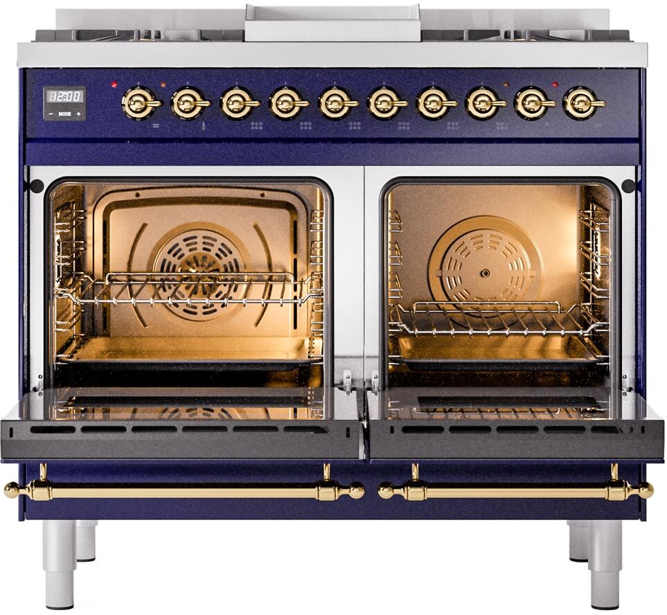 Open-door view of midnight blue dual fuel freestanding range with brass hardware and racks