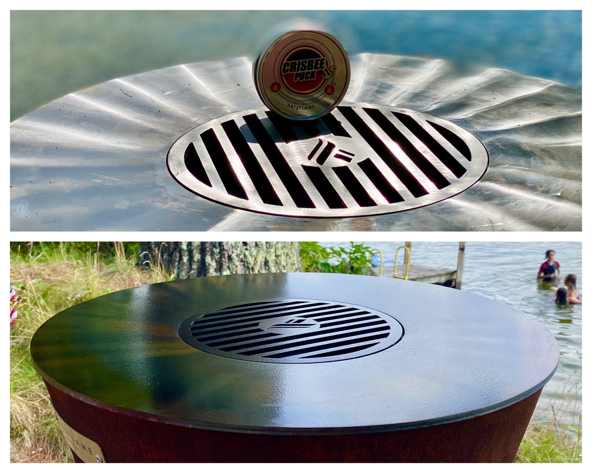 Stainless grill top with Crisbee Puck seasoning tin on central burner opening