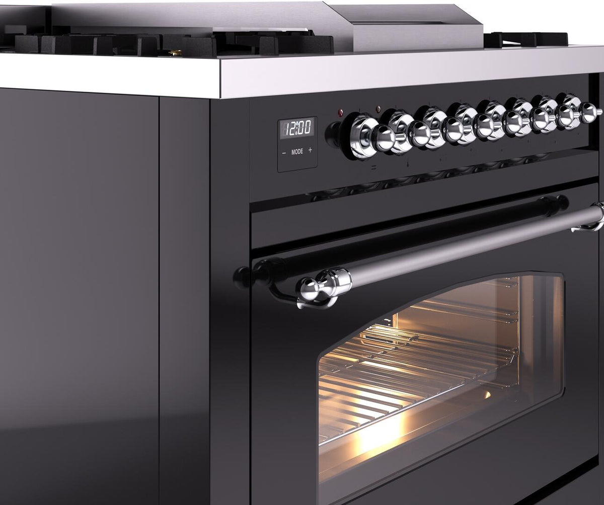 Black range control panel with chrome knobs and chrome oven handle