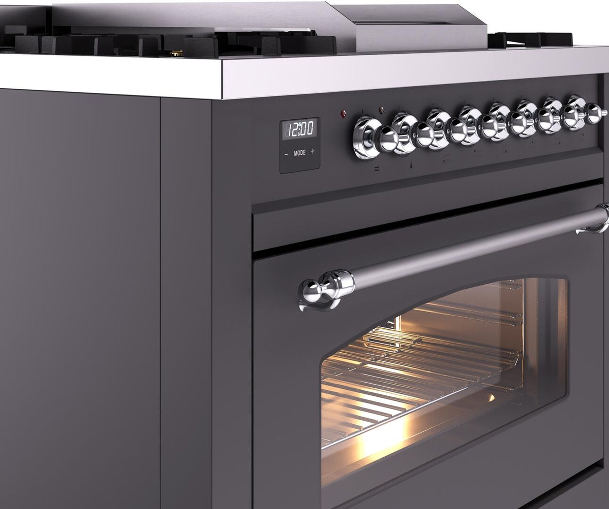 Matte graphite range control panel with chrome knobs and open oven door light