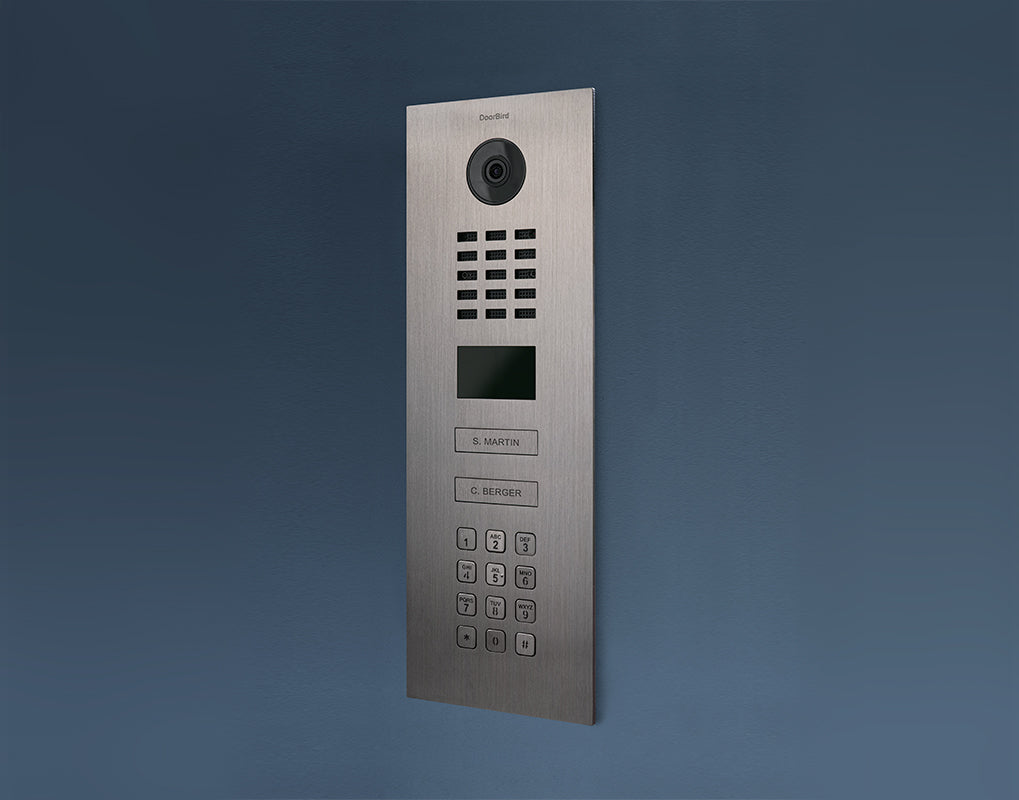 DoorBird IP video door station, brushed silver front with camera, speaker grille, keypad