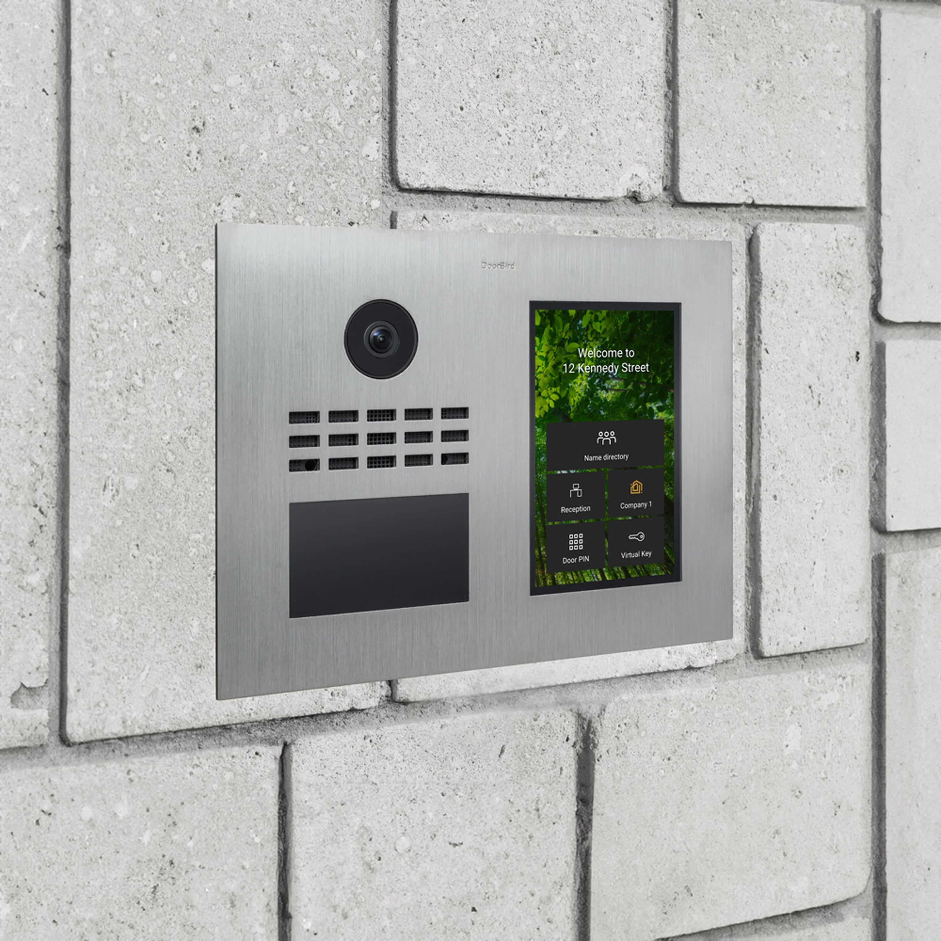 Brushed metal DoorBird IP video intercom with camera, speaker grille, and touchscreen keypad