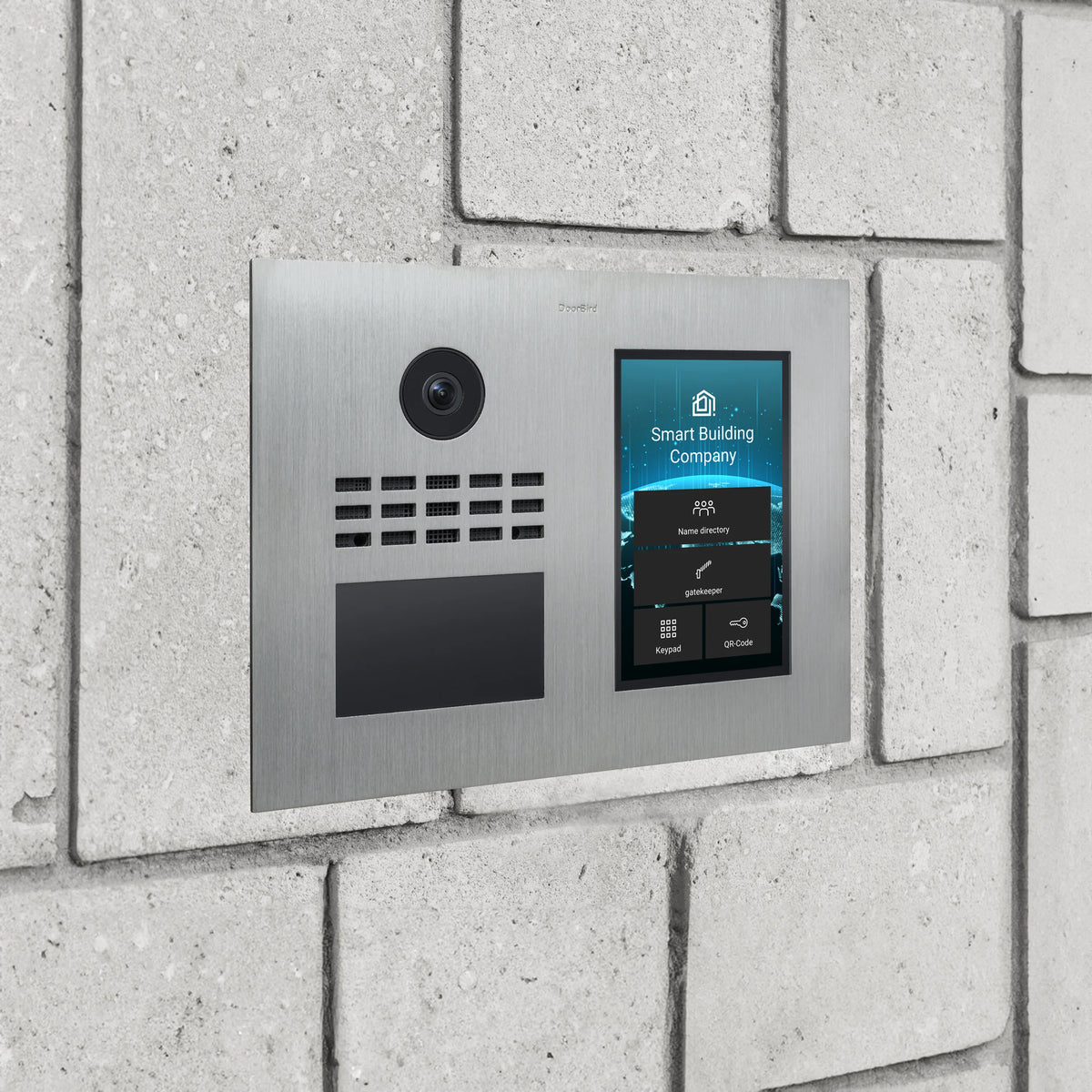 DoorBird video intercom panel on brick wall with camera and blue building app screen