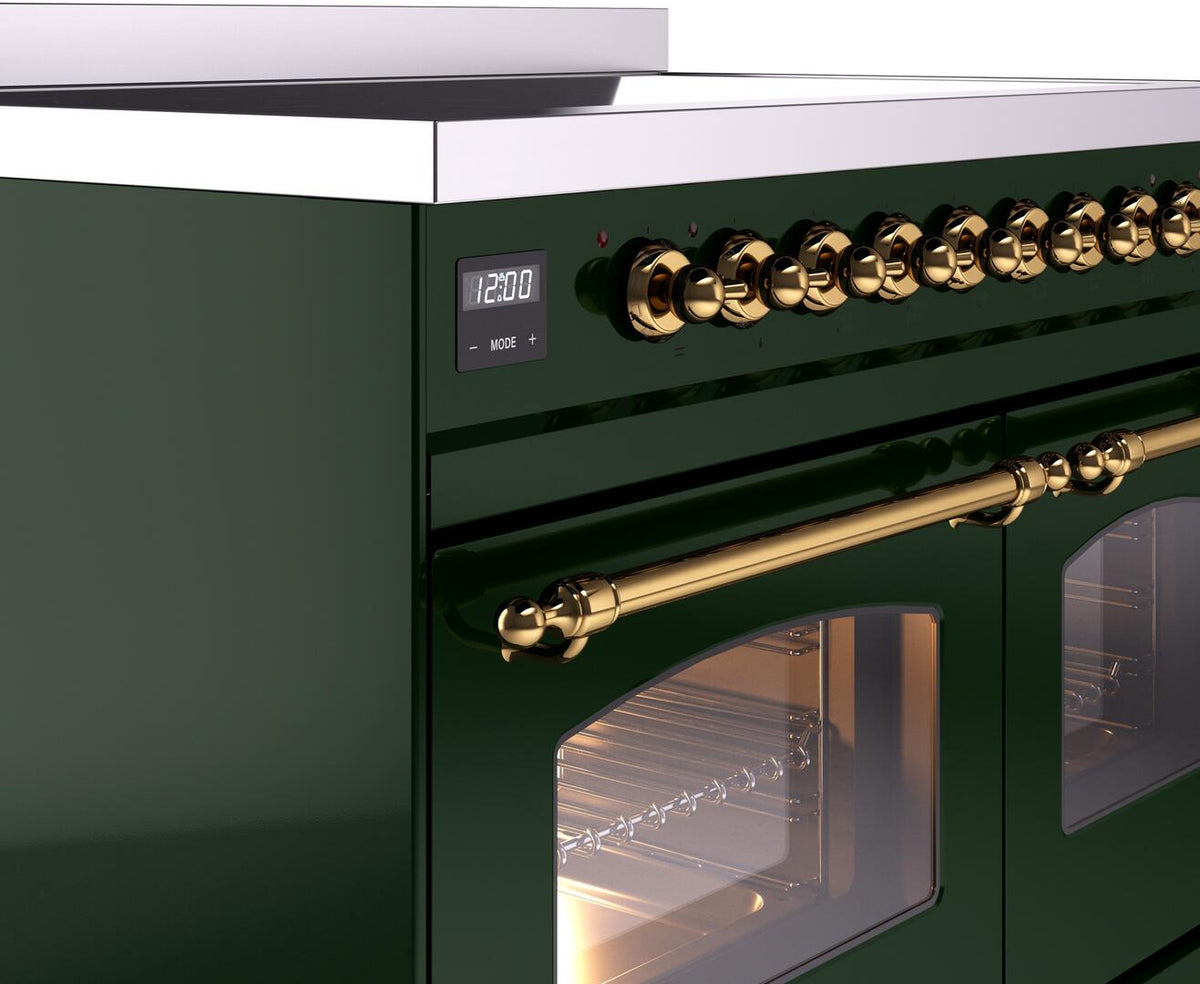 Emerald green range control panel with brass knobs, digital display, and brass rail