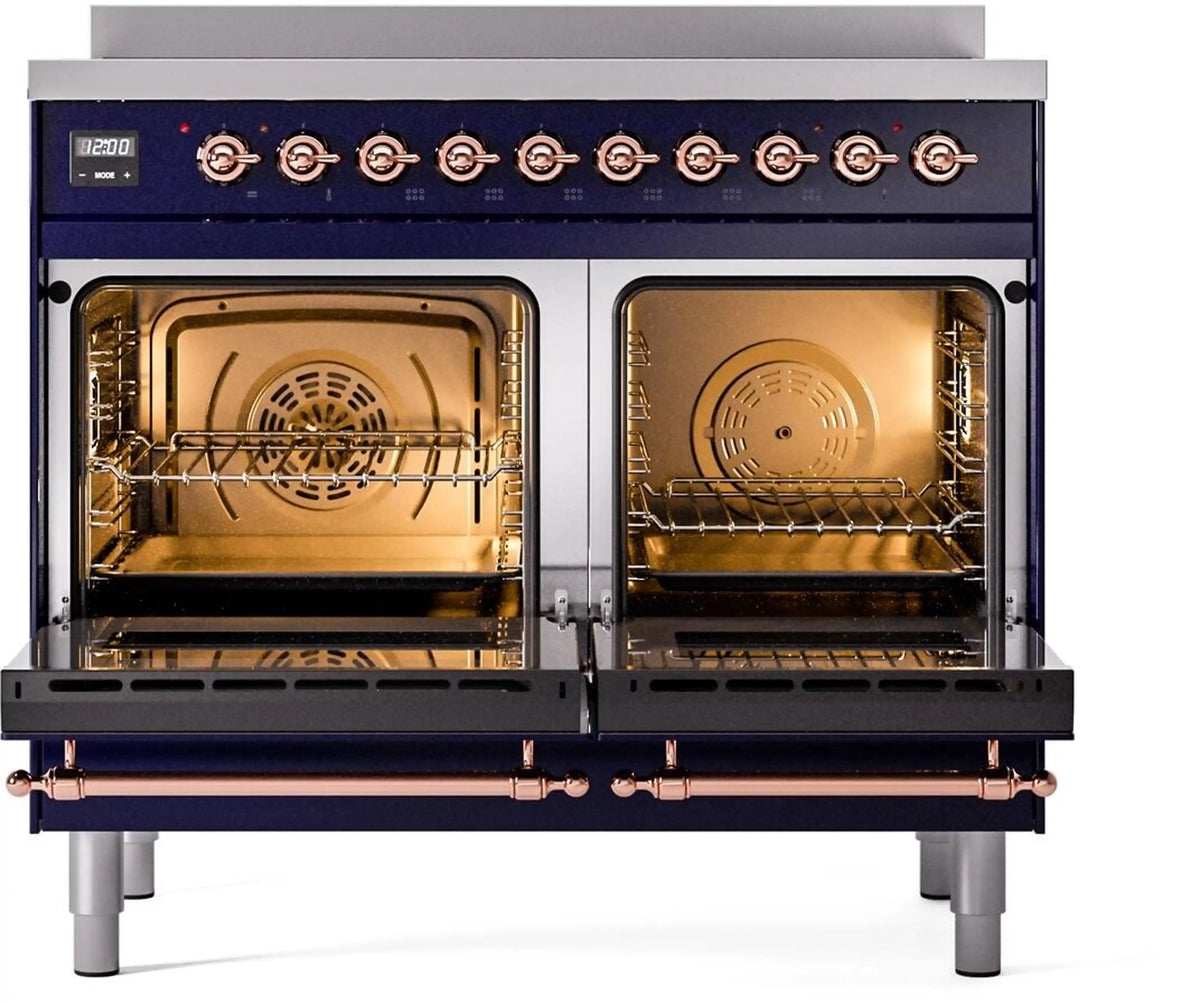 Midnight blue induction range with copper trim, two open ovens and racks.
