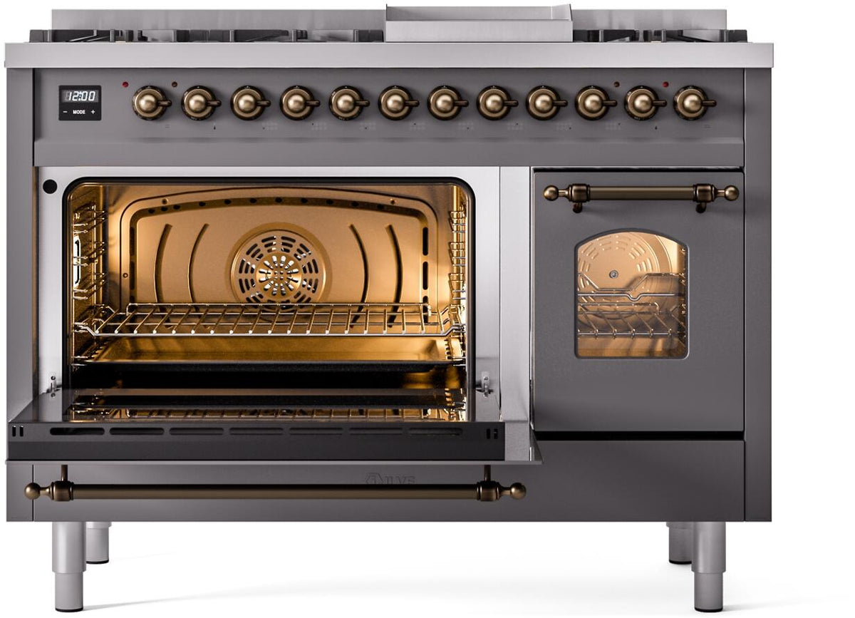 Dual fuel range with oven door open, showing lit interior, racks, and bronze handle