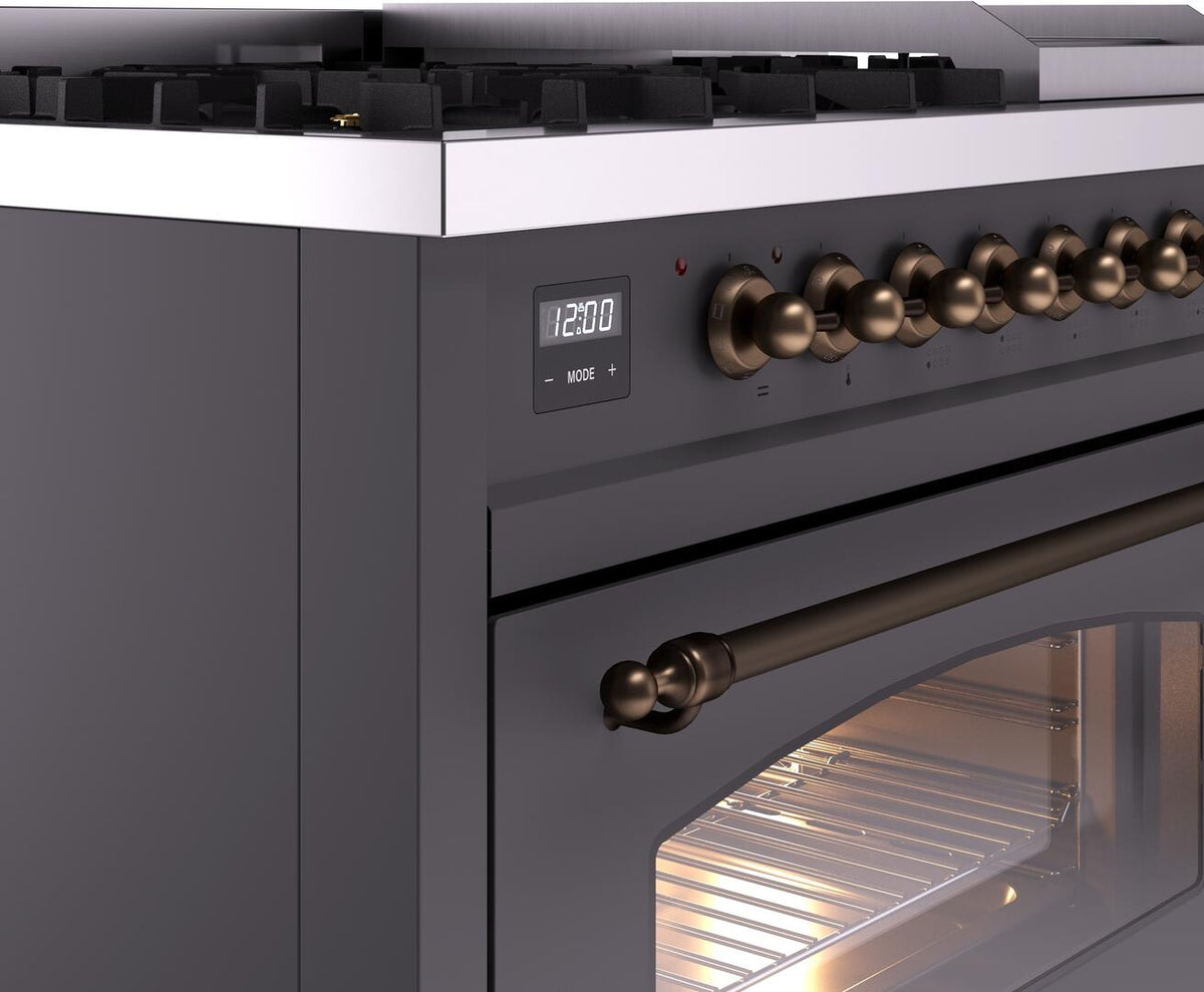 Matte graphite range control panel with bronze knob row and digital display