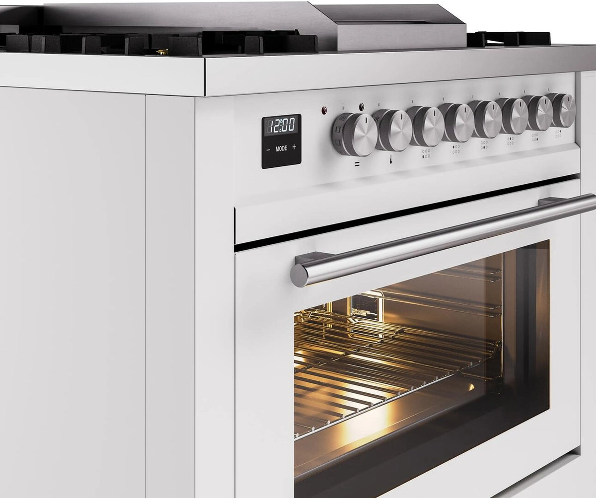 White freestanding range showing control knobs, oven handle, and lit oven interior