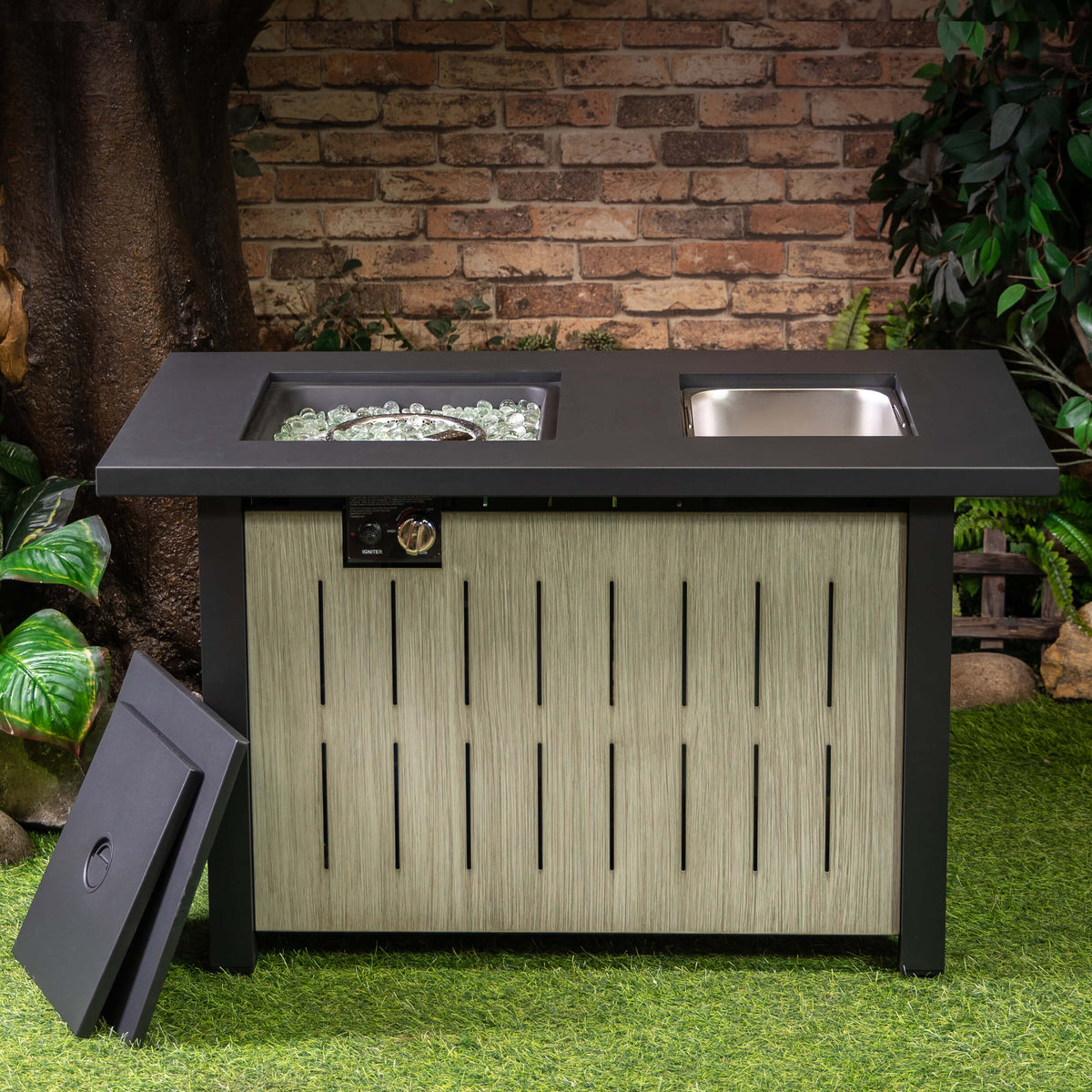 Outdoor propane firetable with silver ice bucket and open burner tray on dark top