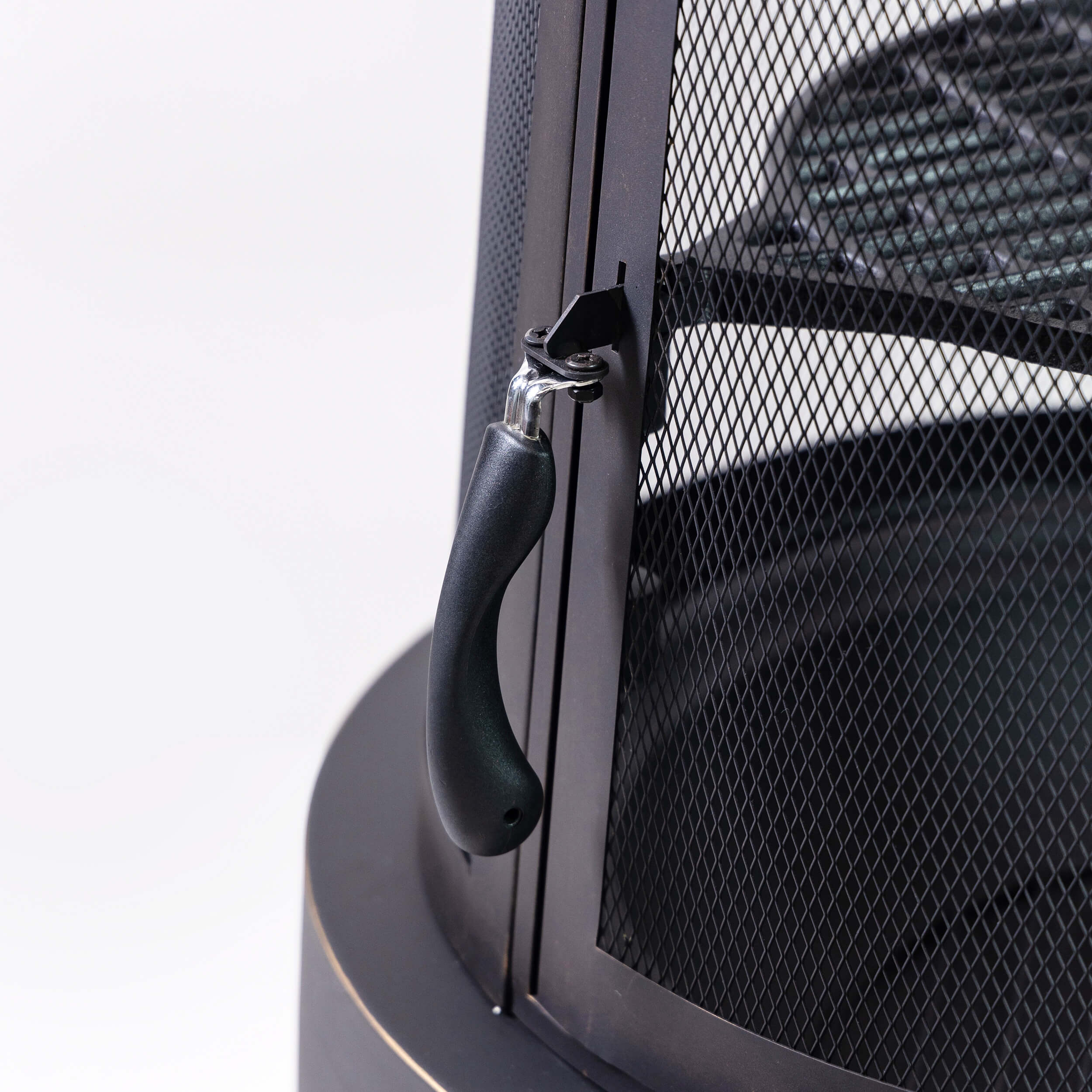 Firepit side latch and handle on mesh door frame, black metal chimney style