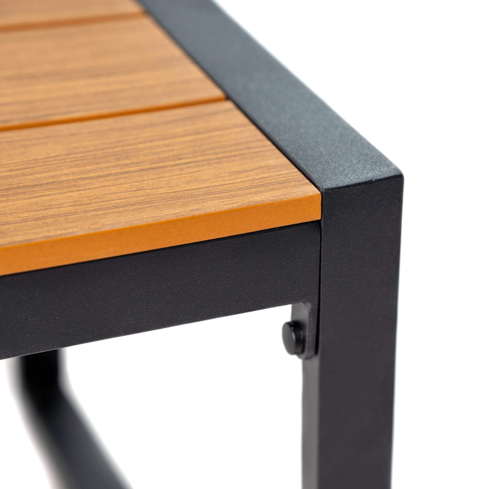 Outdoor sofa chair armrest corner with light wood and black frame detail