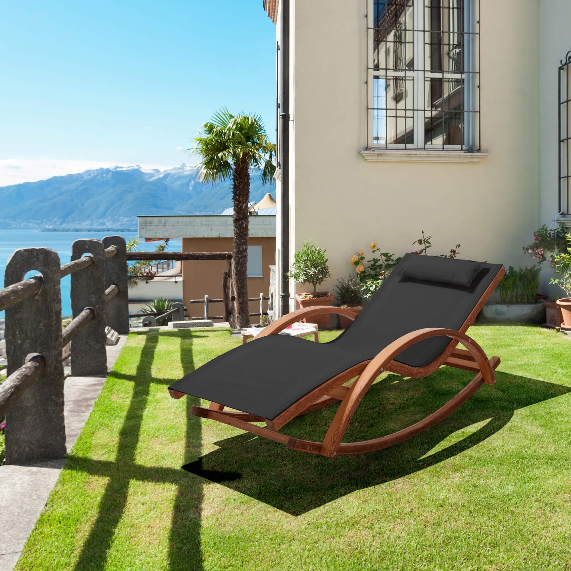 Outdoor patio lounge chair with cedar wood frame and black textilene seat and back