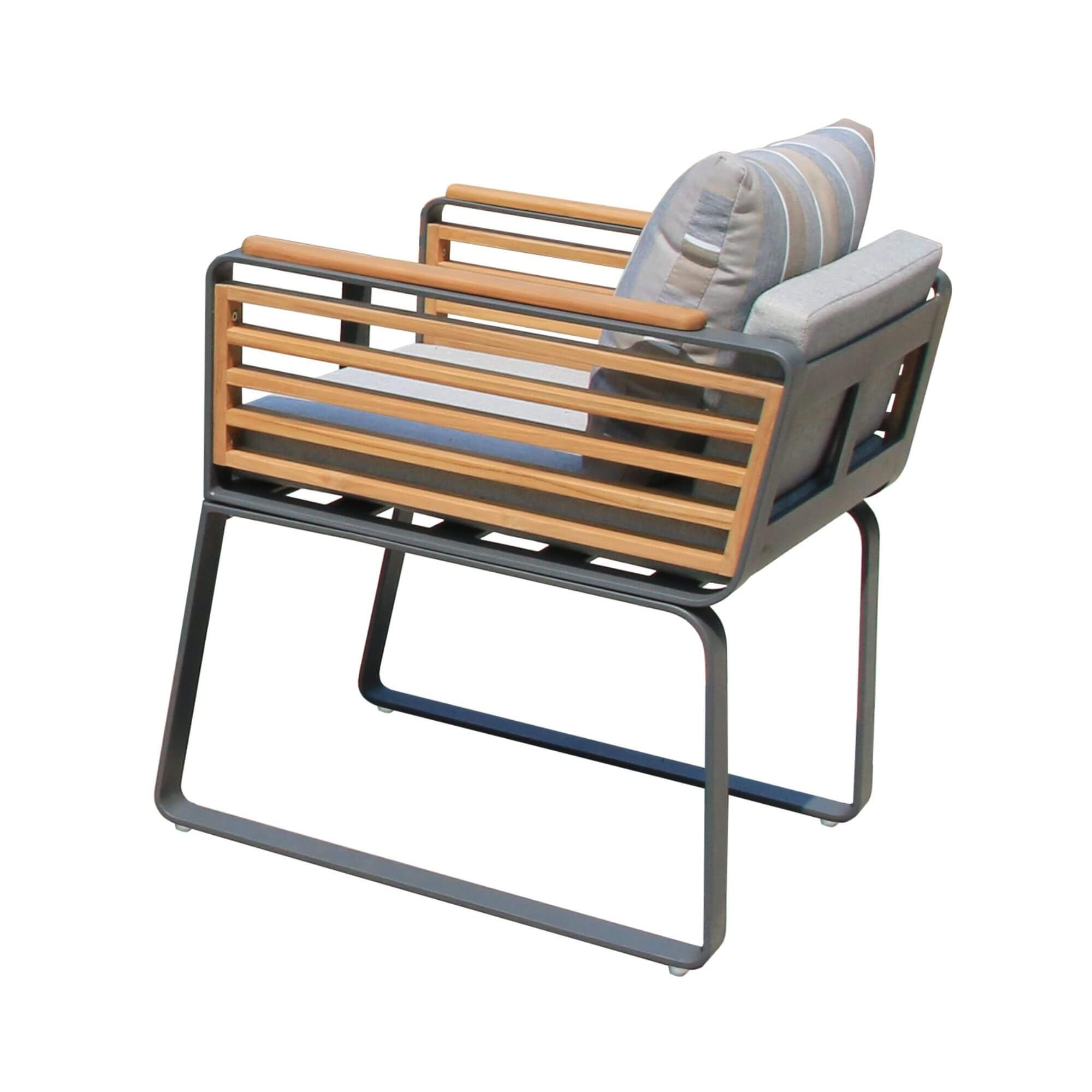 Outdoor dining chair with wood slat back, dark metal base, and striped gray seat cushion